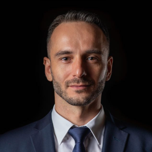 Daniel Giurcă — Comandant tabără